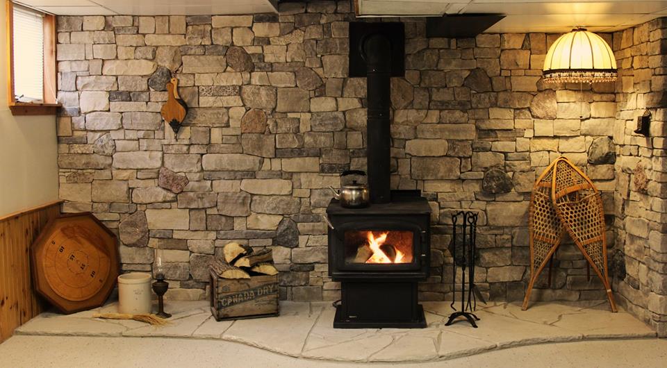 Stone veneer wall and flagstone hearth London Ontario
