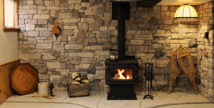 Stone veneer wall and flagstone hearth London Ontario